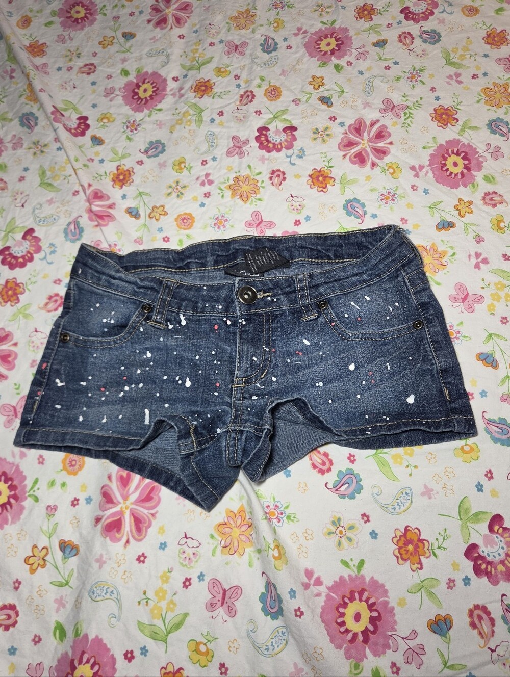 Y2K City Stars low rise denim shorts with Paint splatter